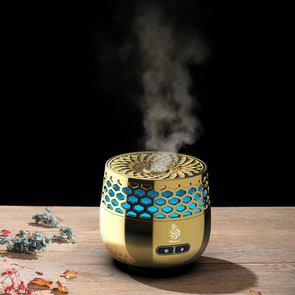 The Seven-Light Electric Bakhoor Burner, gold body with blue hex light vents and top fan