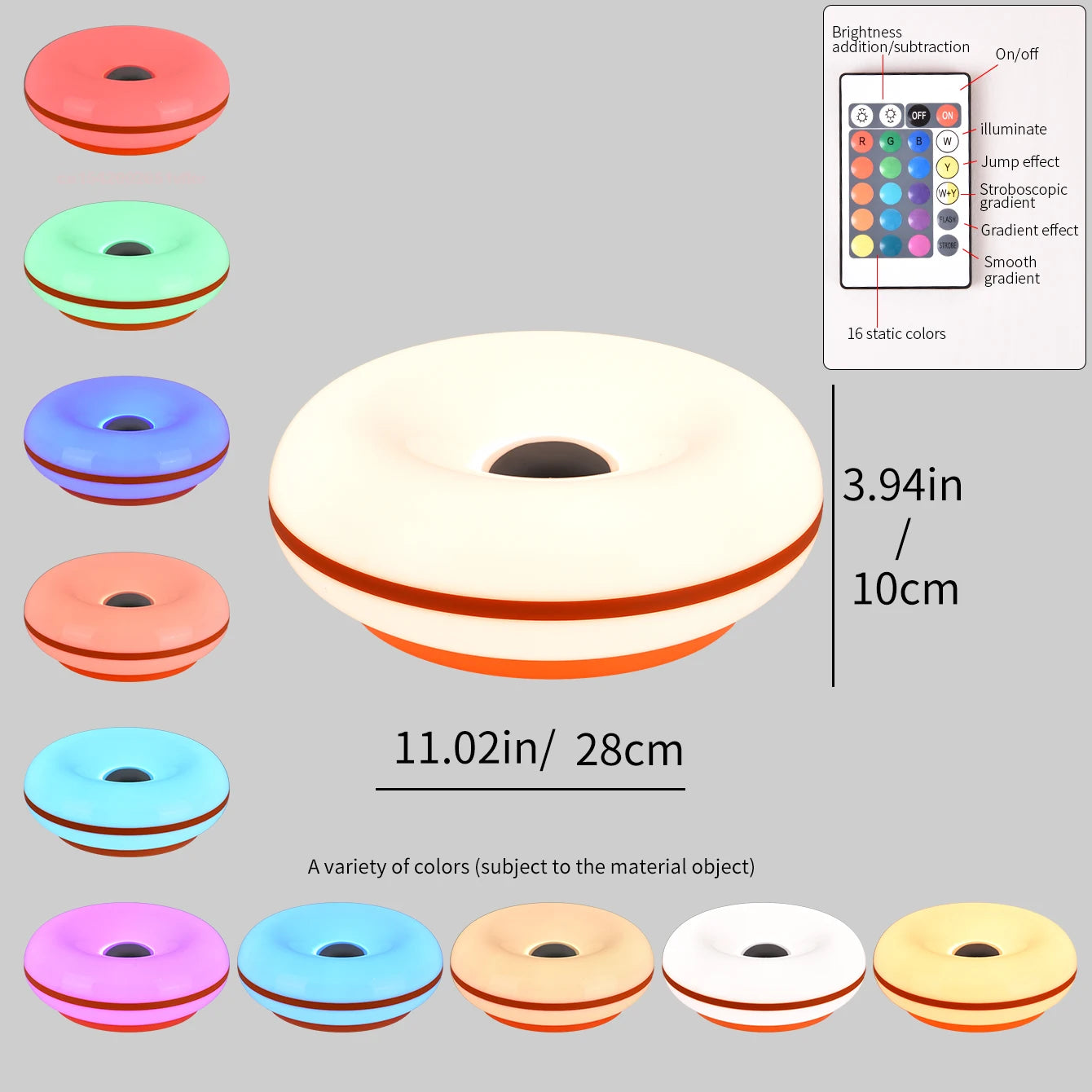 White donut table lamp with multicolor glow band around base, 28cm size shown.