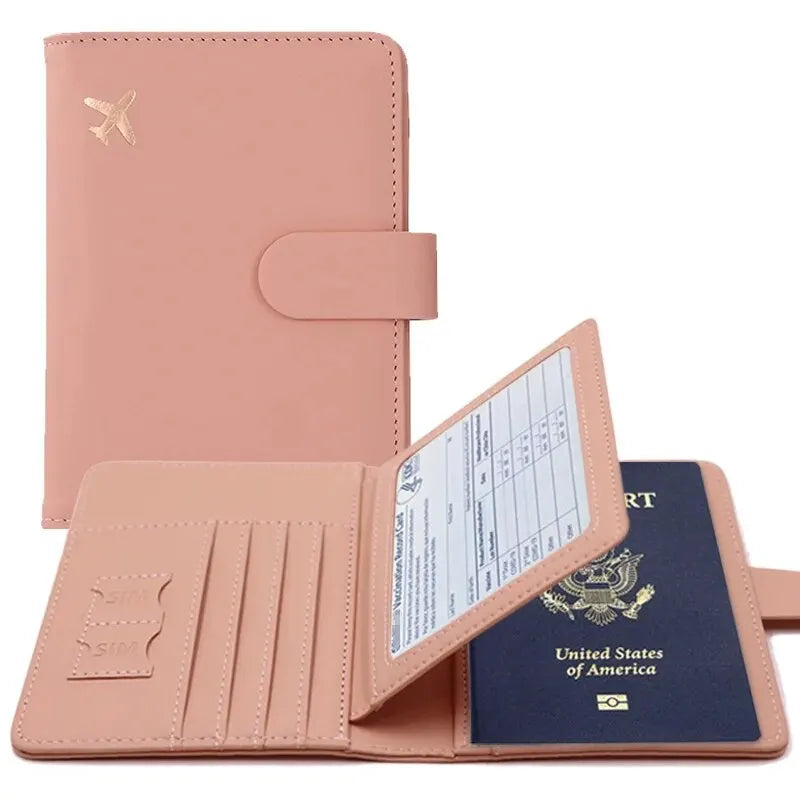 Blush pink passport holder with hasp clasp; open view with card compartments