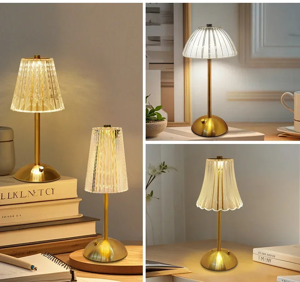 Cordless night lamp on tabletop with ribbed shade and gold base in bright warm light