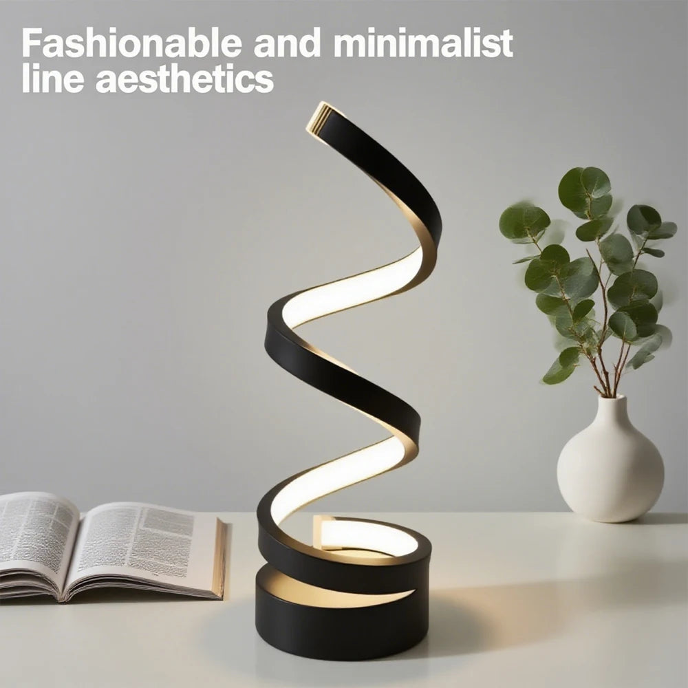 Spiral LED bedside lamp with black base and zigzag glowing light on tabletop