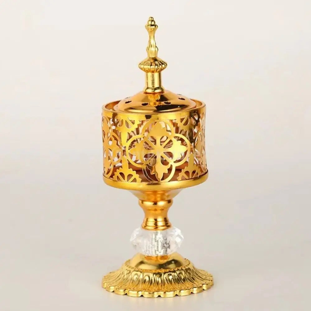 Gold lattice incense holder with floral cutouts and crystal base knob