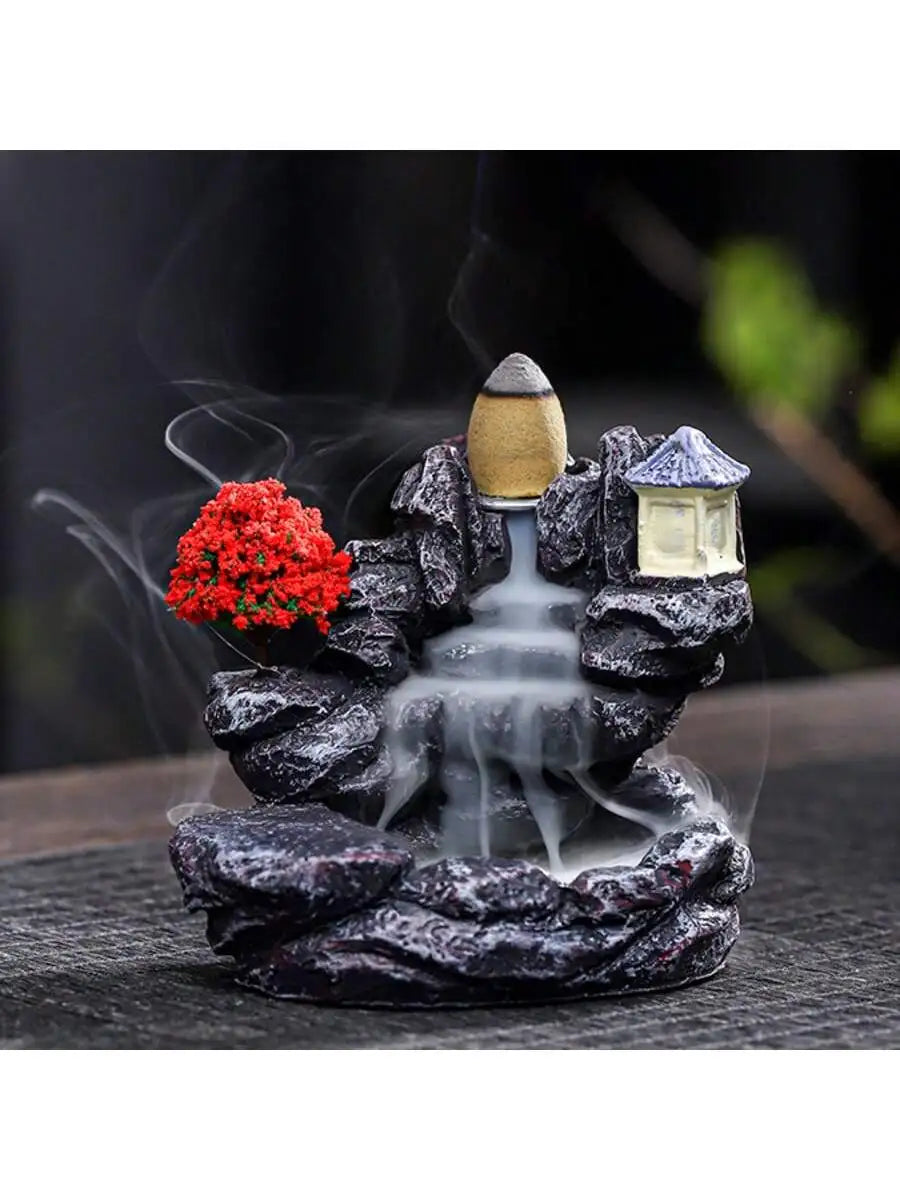 Waterfall backflow incense holder with red flowers, small house, and flowing smoke effect