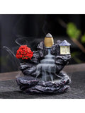 Waterfall backflow incense holder with red flowers, small house, and flowing smoke effect