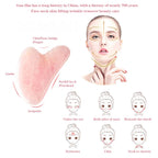 Rose quartz glow roller for face and neck massage with rose-pink heart stone