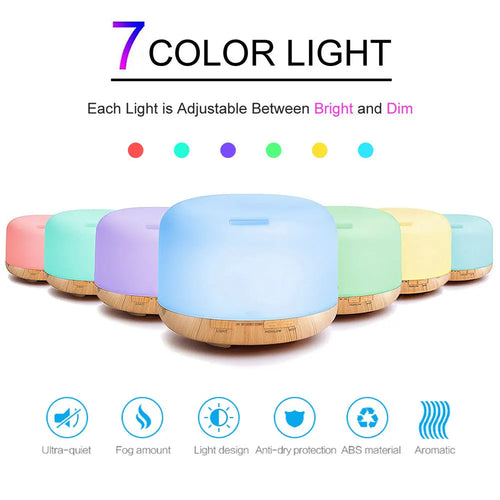 Set of aroma diffusers with colored LED lights and wood-grain bases