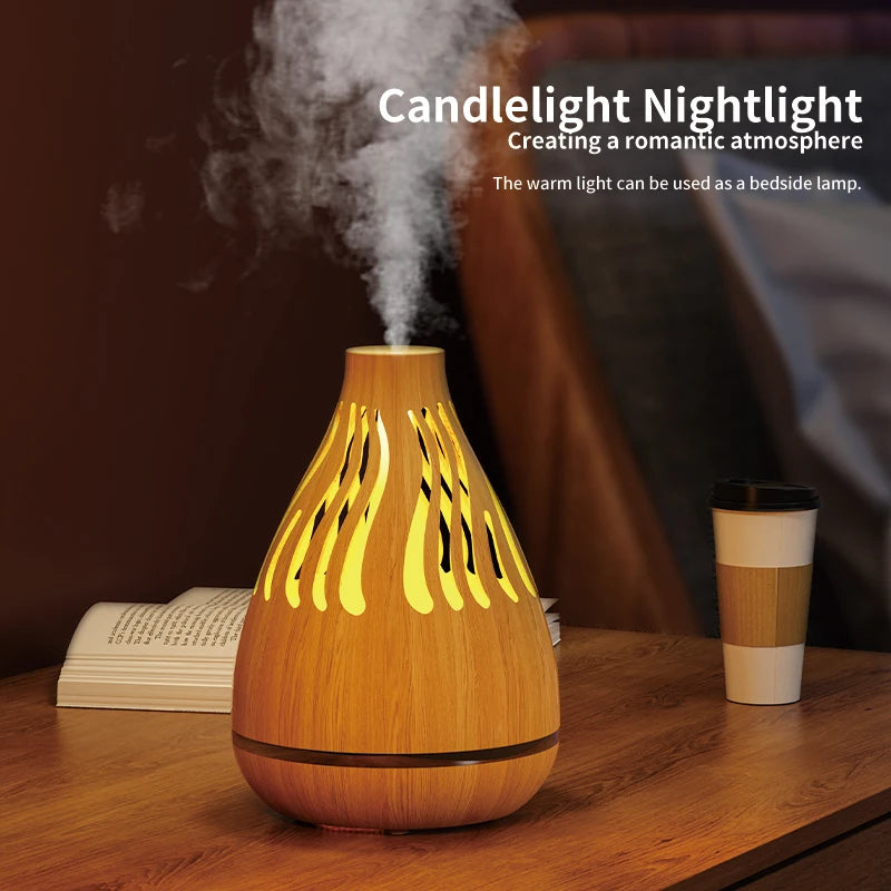 Wood grain aroma diffuser with warm yellow glowing mist vents and visible mist.