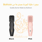 Hair bakhoor diffuser in black and pink with square comb-style heads