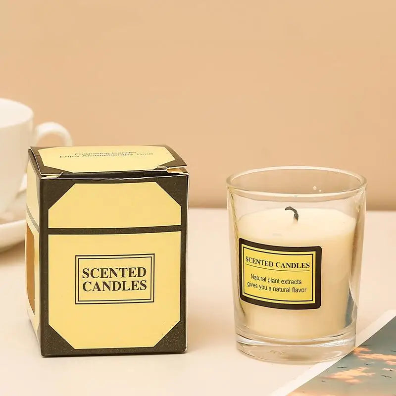Aromatherapy candle in clear glass jar with white wax; gift box included