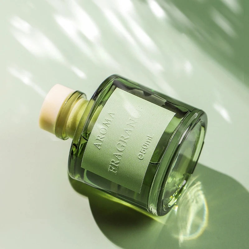 50ml reed diffuser bottle with label and green glass, angled close-up