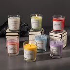 Glass scented candle gift box set, with multiple colored candles and lit wicks