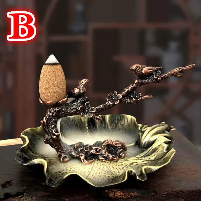 Metal plum branch incense stand with cone incense on leaf basin, smoke drifting