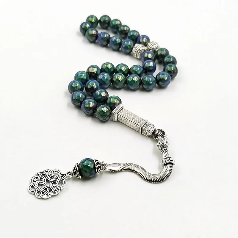 Tasbih misbaha with green-blue 10mm beads, silver rectangular centerpiece, and chain tassel