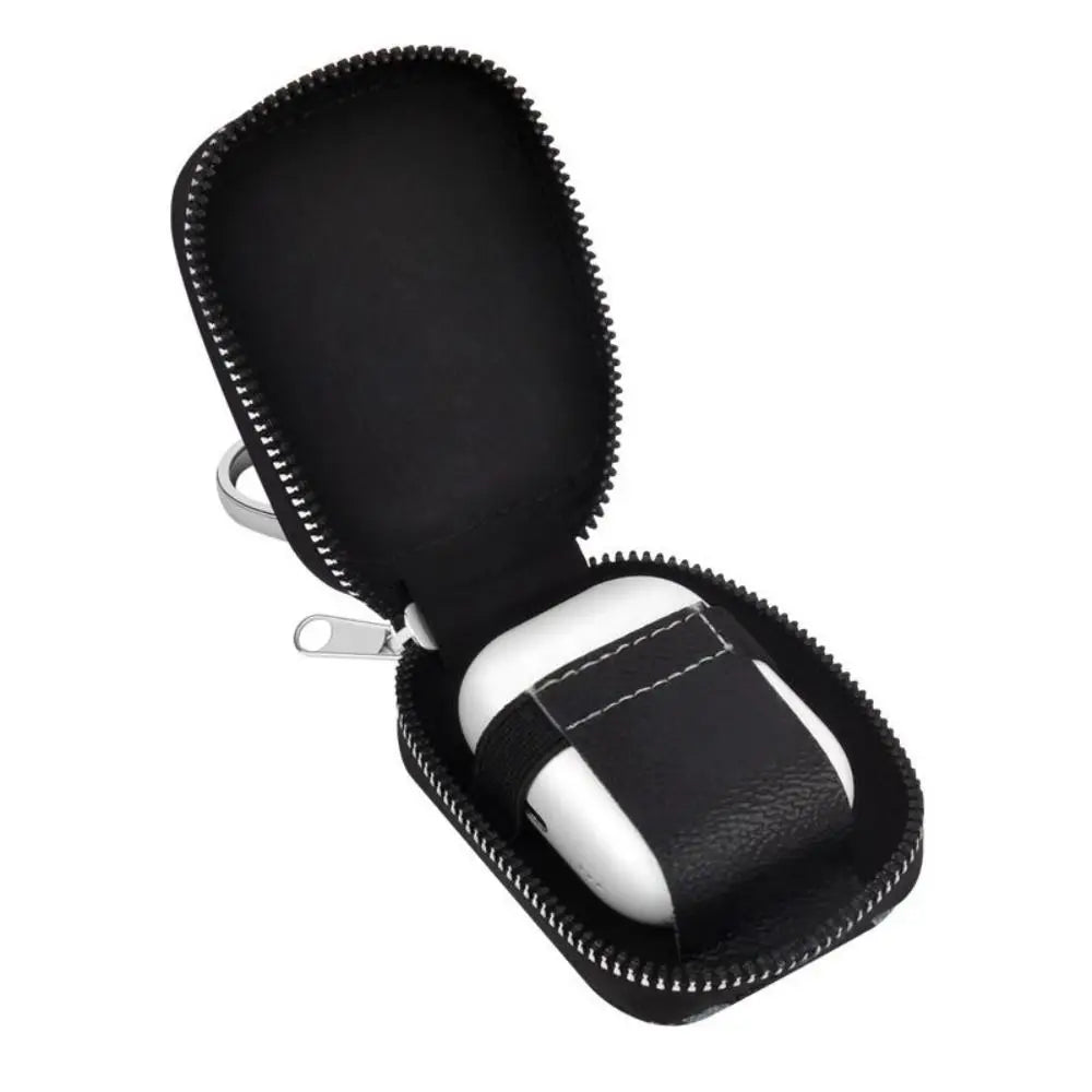 Black PU leather earphone cover with zipper and metal keyring, open for earbuds