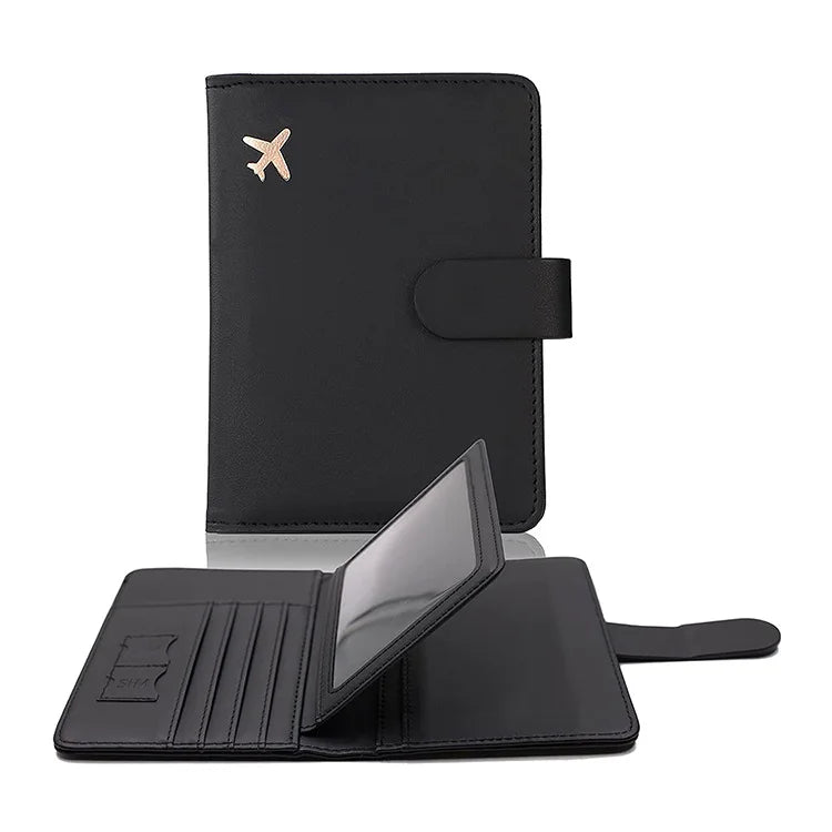 Black passport cover with airplane emblem, hasp flap closure, and visible interior card pockets