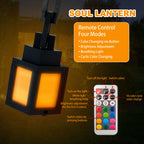 Black pixel lantern night light glowing warm orange squares with remote control in view