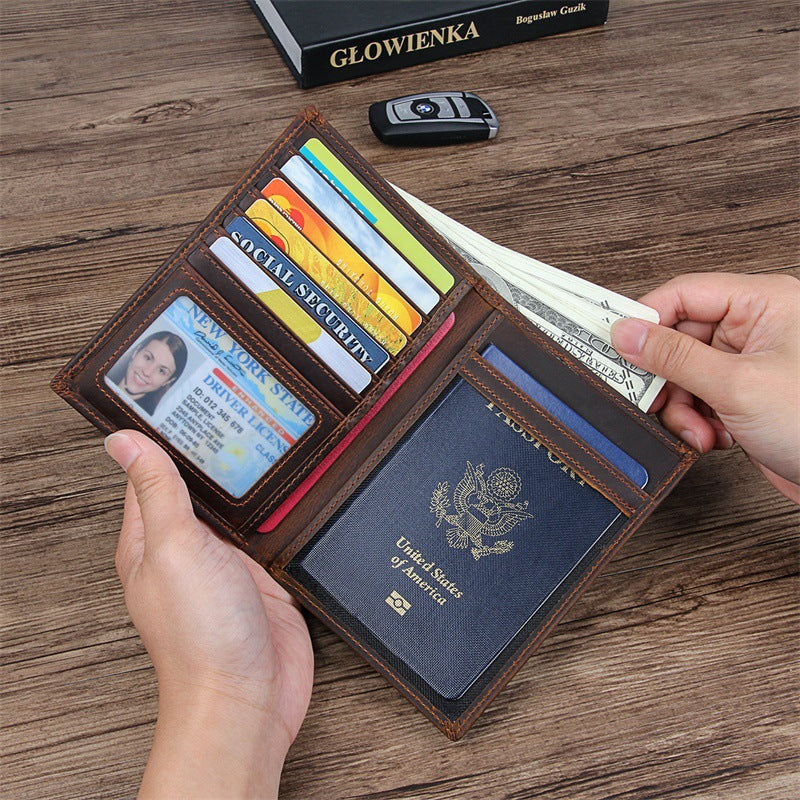 Compact travel document wallet opened, brown leather with multiple card slots and passport sleeve