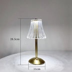 Cordless table lamp dimensions: 28.5cm tall, 11cm base; ribbed glass shade, gold base