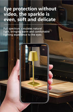 Desk lamp with warm light controlled via smartphone screen