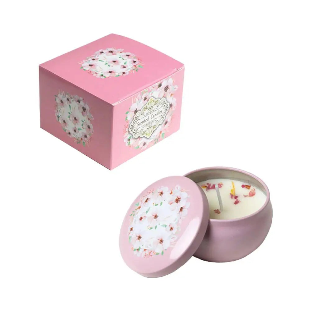 Vintage scented candle jar in pink tin with floral lid and gilt label