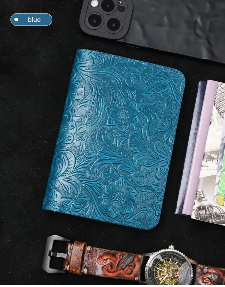 Midnight Blue embossed leather travel folio beside card holder and watch strap