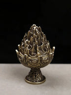 Copper incense censer front view with ornate flame-top bowl and smoke