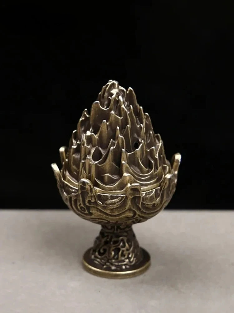 Copper incense censer front view with ornate flame-top bowl and smoke