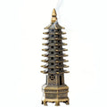 Gold-topped tower incense stand with dark blue pagoda tiers and white base