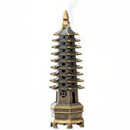 Gold-topped tower incense stand with dark blue pagoda tiers and white base
