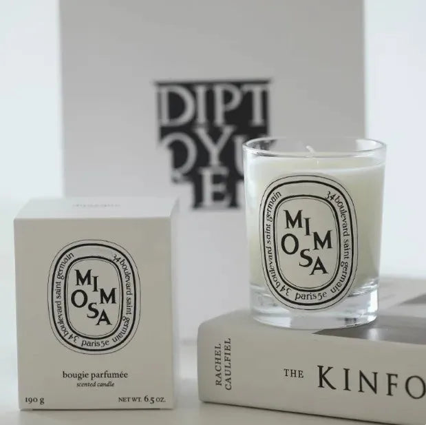 190g scented botanical candle in glass jar with MIMOSA label and pale wax