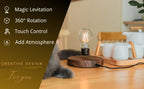Glowing levitating bulb on wooden base with black cable across the tabletop