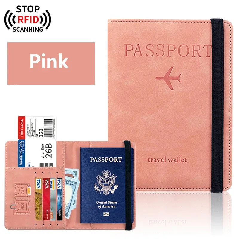 Blush pink passport wallet with elastic strap and card holder sleeves, travel organizer