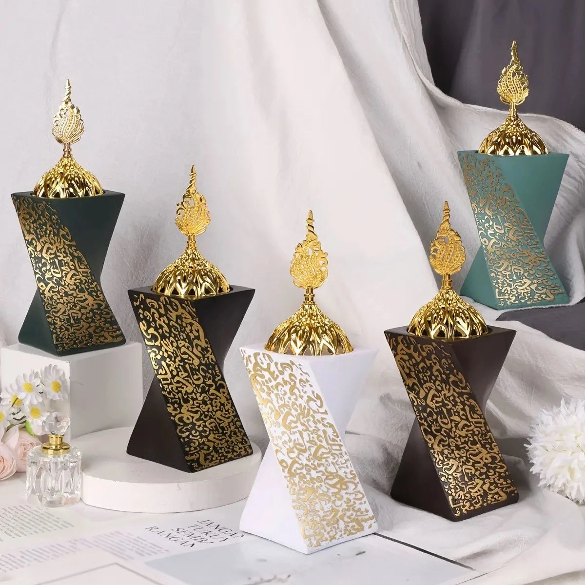Naqsh resin bakhoor burners set with black and white bases and gold ornate tops