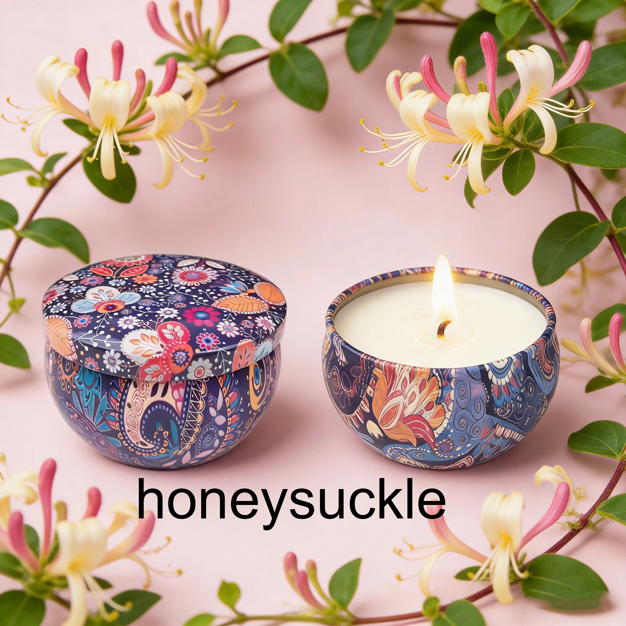 Honeysuckle scented tin candles, one lid and one lit flame
