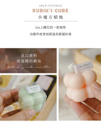 Pastel bubble candle cluster with label, shown in hand