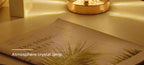 Pearl white crystal oval lamp, partially cropped on bedside table
