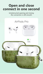 Emerald green crocodile-grain AirPods Pro case with open lid design and keychain.