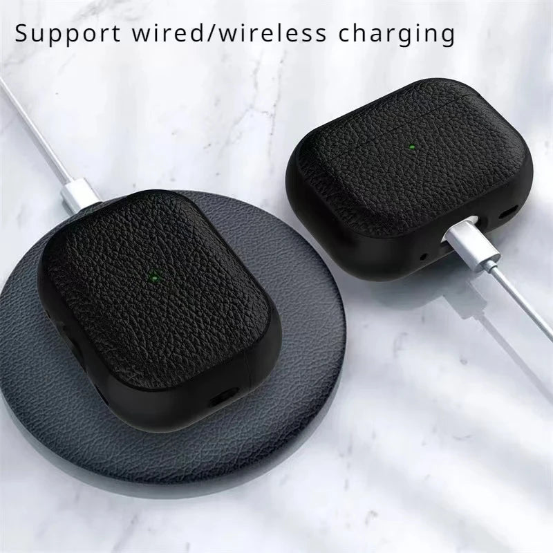 Black leather AirPods keyring case with charging port cutout and side speaker holes