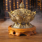 Antique bronze lotus incense burner with flame finial and vented base