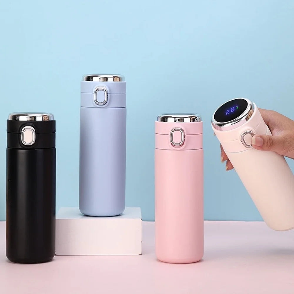 Compact smart thermos, 400ml with digital temperature display, hand holding pink