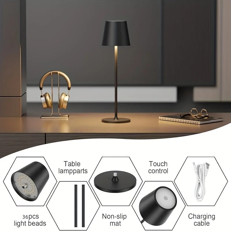 Wireless touch table lamp with black shade and bronze-gold stand on a tabletop