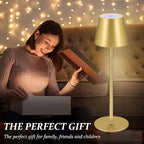 Gold wireless touch table lamp with fabric shade and glowing light in living room