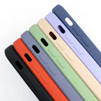 Silicone MagSafe phone case sides in black, orange, light blue, green, and beige with cutouts