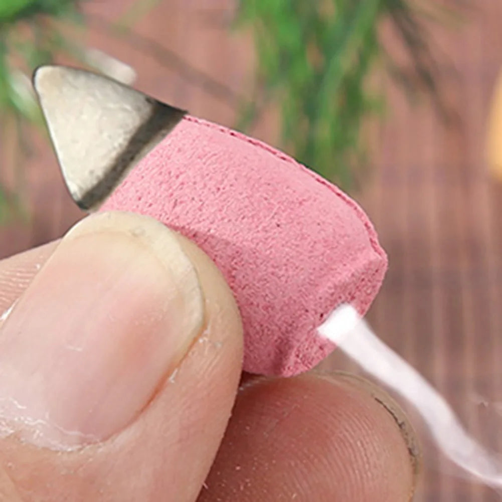 Backflow incense cone refill set cones in pink and beige, close-up