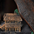 Misty Peaks backflow incense burner, textured pagoda house with smoke drifting