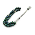 Color-shift tasbih misbaha strand with green-blue beads and silver-toned prayer counter chain