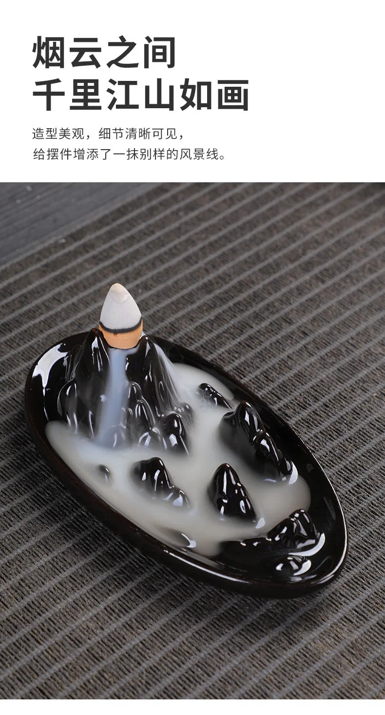 Tower backflow incense burner tray with flowing white smoke and black rim