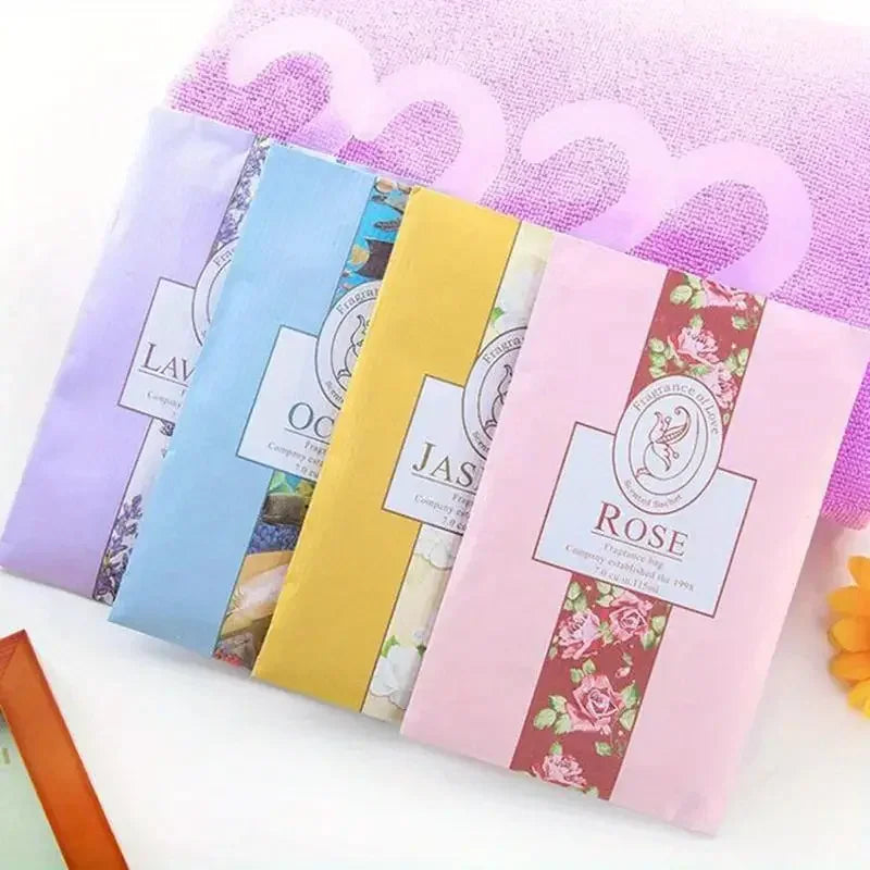 Assorted hanging sachet cards in pastel colors—rose, ocean, yellow, lavender