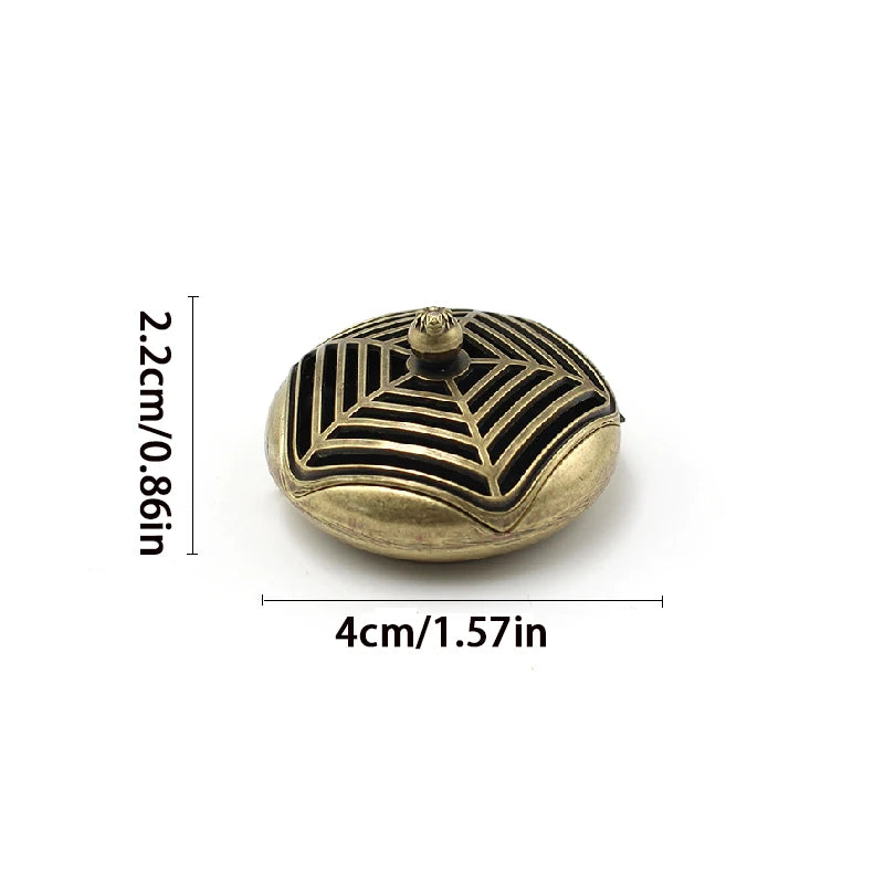 Brass pocket incense burner lid with geometric lattice engraving; 2.2cm (0.86in) tall