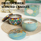 Two vintage jar scented candles on woven tray, one blue with patterned lid and one open